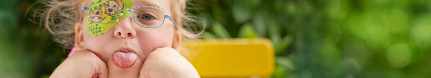 Entête Fille avec cache oculaire ORTOPAD® « Chiens », sort la langue